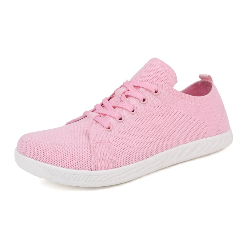 Unisex sneakers met brede neus op blote voeten